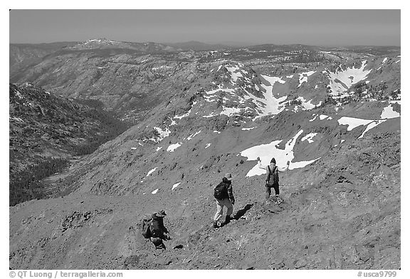 Hikers below Round Top Mountain. Mokelumne Wilderness, Eldorado National Forest, California, USA