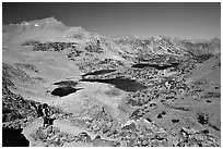 Backpacker on Bishop Pass trail, Inyo National Forest. California, USA ( black and white)