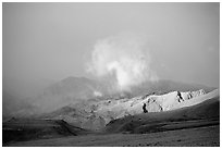 Cloud and Inyo Mountains  in stormy weather, late afternoon. California, USA ( black and white)