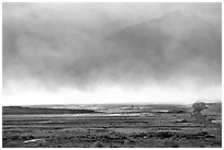 Mineral deposits of dry lake stirred up by a windstorm, Owens Valley. California, USA (black and white)