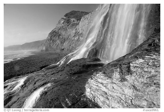 Alamere Falls flowing onto the beach. Point Reyes National Seashore, California, USA (black and white)