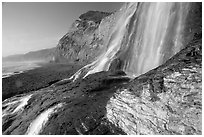 Alamere Falls flowing onto the beach. Point Reyes National Seashore, California, USA (black and white)