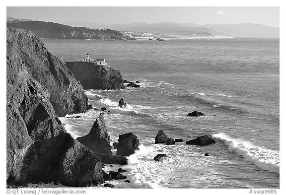 Cliffs and Point Bonita Lighthouse, late afternoon. California, USA (black and white)