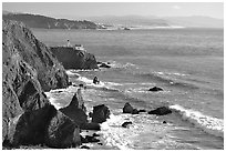 Cliffs and Point Bonita Lighthouse, late afternoon. California, USA (black and white)