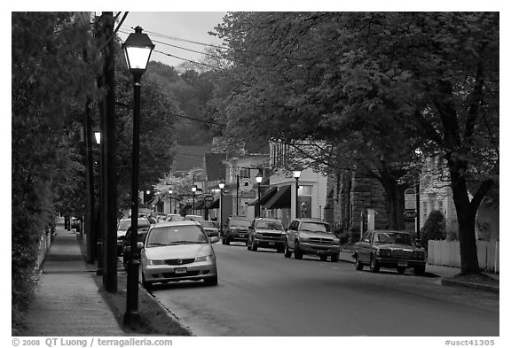 Street and storefronts at dusk, Essex. Connecticut, USA