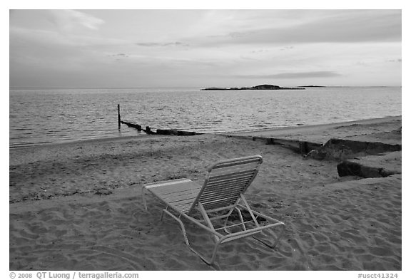 Beach chair at sunset, Westbrook. Connecticut, USA