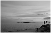 Beach with atlantic sunset and couple, Westbrook. Connecticut, USA ( black and white)