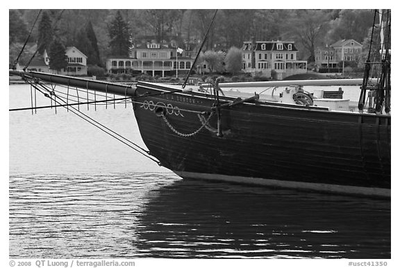 LA Dunton schooner and houses across the Mystic River. Mystic, Connecticut, USA