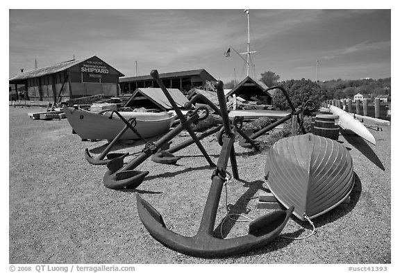 Anchors and small boats. Mystic, Connecticut, USA