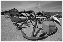 Anchors and small boats. Mystic, Connecticut, USA ( black and white)