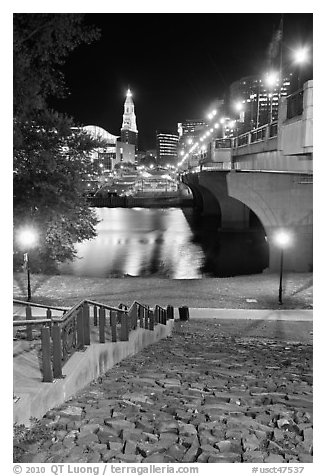 Quay by Connecticut River and nighttime skyline. Hartford, Connecticut, USA (black and white)