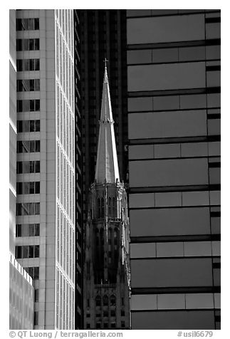 Church spire and modern buildings. Chicago, Illinois, USA