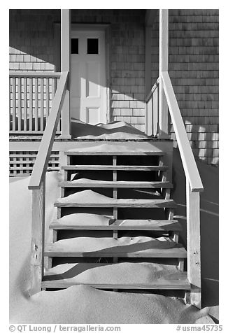 Drifting sands on porch, Old Harbor life-saving station, Cape Cod National Seashore. Cape Cod, Massachussets, USA