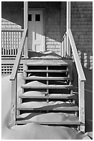 Drifting sands on porch, Old Harbor life-saving station, Cape Cod National Seashore. Cape Cod, Massachussets, USA ( black and white)