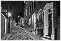 Cobblestone narrow street by night, Beacon Hill. Boston, Massachussets, USA (black and white)