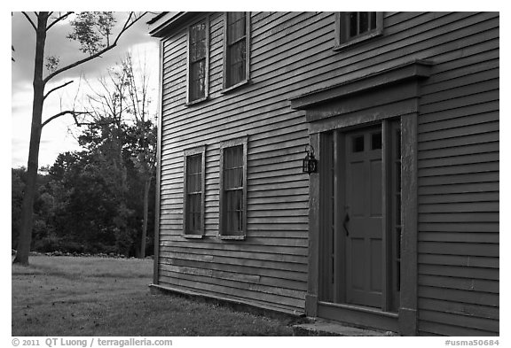 Historic house with grazing light, Minute Man National Historical Park. Massachussets, USA (black and white)