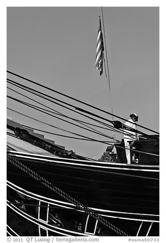 Sailor and flag on USS Constitution (9/11 10th anniversary). Boston, Massachussets, USA (black and white)