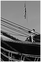 Sailor and flag on USS Constitution (9/11 10th anniversary). Boston, Massachussets, USA (black and white)