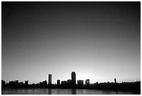 Downtown seen across the Charles River, winter sunrise. Boston, Massachussets, USA (black and white)
