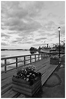 Deck, lamp, and Katahdin steamer at sunset, Greenville. Maine, USA (black and white)