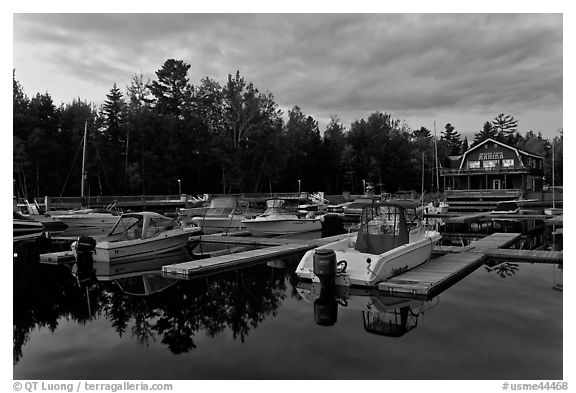 Boats in Beaver Cove Marina at dusk, Greenville. Maine, USA (black and white)