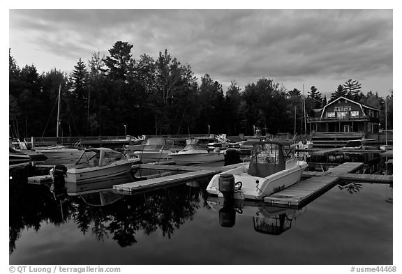 Boats in Beaver Cove Marina at dusk, Greenville. Maine, USA (black and white)