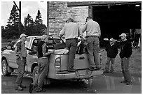 Game wardens check antler length of killed moose, Kokadjo. Maine, USA (black and white)