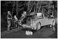 Hunters with moose in back of truck. Maine, USA (black and white)