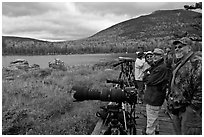 Wildlife photographers on observation platform, Sandy Stream Pond. Baxter State Park, Maine, USA ( black and white)