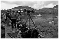 Cameras set up with telephoto lenses, Sandy Stream Pond. Baxter State Park, Maine, USA ( black and white)