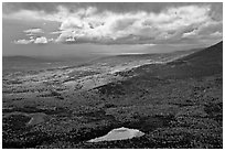 View with storm light and clouds over slopes covered with fall foliage. Baxter State Park, Maine, USA ( black and white)