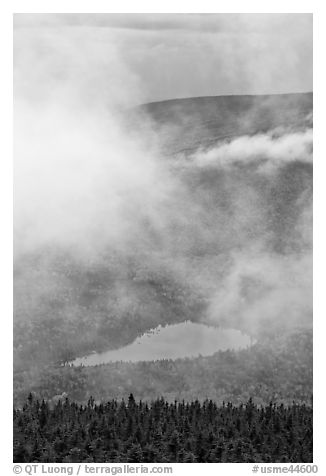 Clouds parting above Sandy Stream Pond. Baxter State Park, Maine, USA (black and white)