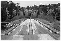 Wood bridge in the fall. Allagash Wilderness Waterway, Maine, USA (black and white)