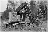 Tracked forest harvester. Maine, USA (black and white)