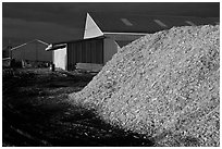 Sawdust in lumber mill at night, Ashland. Maine, USA ( black and white)
