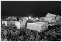 Lumber stacks at night, Ashland. Maine, USA (black and white)