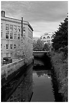 Kenduskeag stream flows dowtown. Bangor, Maine, USA (black and white)