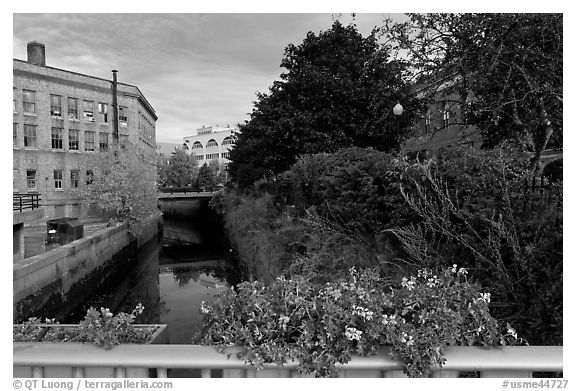 Bridge with flowers over the Kenduskeag stream. Bangor, Maine, USA