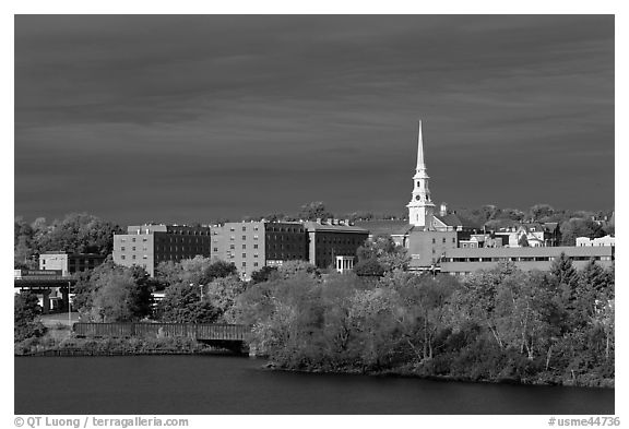 Penobscot River and downtown with storm clouds. Bangor, Maine, USA