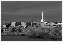 Penobscot River and downtown with storm clouds. Bangor, Maine, USA (black and white)