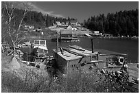 Old schack and harbor. Stonington, Maine, USA ( black and white)