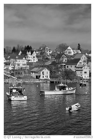 Lobster boats and houses on hillside. Stonington, Maine, USA