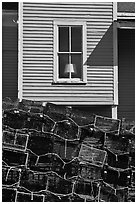 Lobster traps and window. Stonington, Maine, USA (black and white)