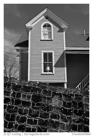 Lobster traps and house. Stonington, Maine, USA