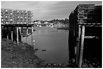 Lobster traps framing harbor. Corea, Maine, USA (black and white)