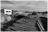 Deck, lobster traps, and harbor. Corea, Maine, USA ( black and white)