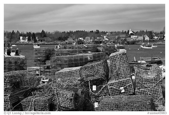 Lobster traps and village. Corea, Maine, USA