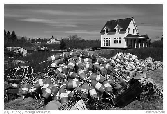 Buoys and house. Corea, Maine, USA