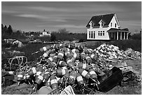 Buoys and house. Corea, Maine, USA (black and white)