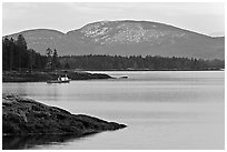 Frenchman Bay with snow-covered Cadillac Mountain in winter. Maine, USA (black and white)